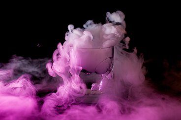 Glass with pink smoke