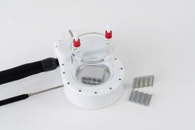 Liquid-free cooling plate for FroSyn sample cooling station